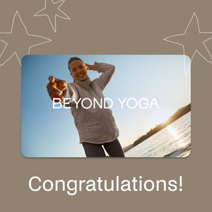 Woman practicing yoga on a beach with 'Beyond Yoga' branding and 'Congratulations!' text.