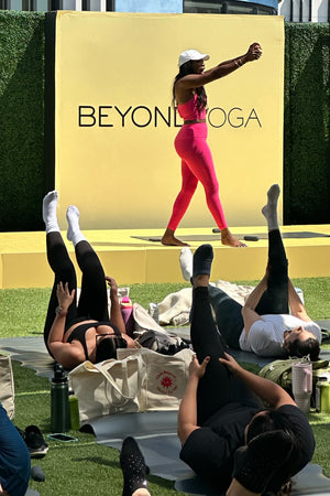 group of people at beyond yoga event. 
