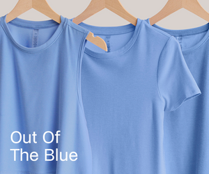 Three blue t-shirts on hangers with 'Out Of The Blue' text.